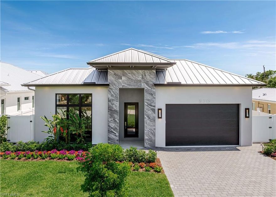 Fabulous pair of new custom homes close to the beach in Naples Park. 530 107th is finished and 536 107th is coming soon. Each home offers its own unique aesthetic master class: subtle and sophisticated design by Clive Daniel Home, built by LaGrasta. 530 features 4 ensuite bedrooms, a spa-like master bath, snazzy powder room, and a study/office. Elegant formal entry foyer leads into an open-concept layout with soaring ceilings, custom carpentry, marble mosaic and luxury tiles, and layered lighting that highlights incredible relationships between tone, pattern, texture, color, and nature. Chef’s kitchen includes waterfall countertops, built-in bar, Fulgor Milano appliances, XO wine fridge, Asko dishwasher, and a Culligan whole-house water filter/softener. Enjoy seamless indoor-outdoor living with a resort-style lanai, saltwater pool, meticulously landscaped grounds, Solo firepit, and Sonos sound system—ready for a party! Security features include an alarm system, prewiring for cameras, and X500. Authentic double garage on a rare 60’ wide lot just minutes from top rated Delnor-Wiggins State Park & Beach.