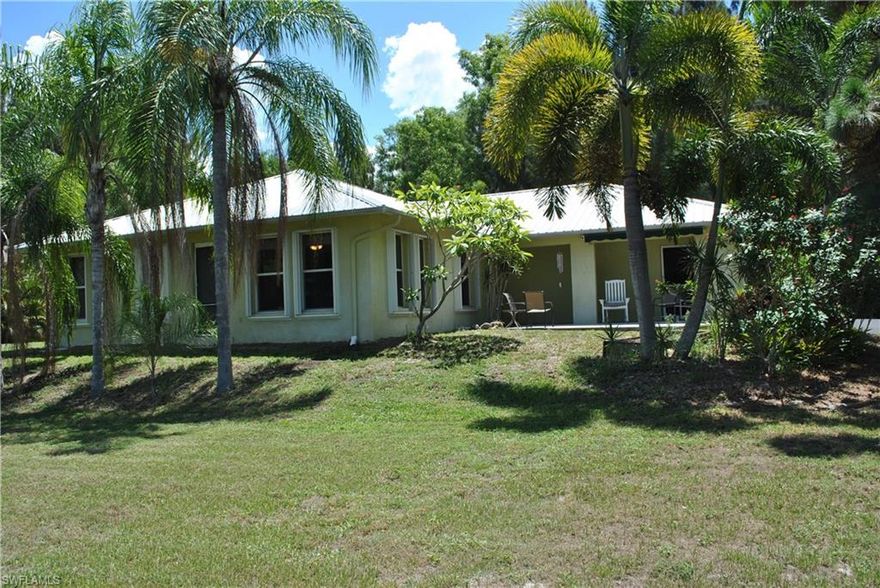 Cute, well maintained CBS home in the fish streets. Standing seam metal roof in 2005, new a/c in 2016. Tile floors throughout. Open concept with extra space for an office. Enclosed lanai with sliders to main house. Lot to the east also available. Buy the lot next door to the east (MLS listing #216041235) with the ability to build an RV or boat garage/barn or put in a pool! Nice quiet community close to fishing, boating, restaurants, Lee County library and community pool and tennis. Located on the Pine Island Ridge which does not require flood insurance. Lots of possibilities here!