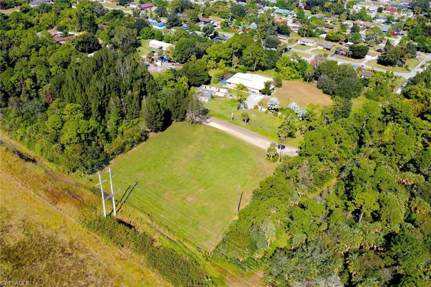 Discover an incredible opportunity to own 2 acres of residential land in the desirable Southern Immokalee Heights community. This partially cleared parcel offers privacy, space, and flexibility—ideal for building a custom home, creating a family estate, or investing in one of Immokalee’s growing areas. With 87,120 sq ft of land, you’ll enjoy an expansive layout surrounded by natural wooded views, all while remaining close to essential utilities and located on a quiet, lightly traveled road. Conveniently positioned near top Collier County schools—including Pinecrest Elementary, Immokalee Middle, and Immokalee High—this location also provides easy access to shopping, dining, and recreation. Residents will enjoy being minutes from Immokalee Plaza, the Immokalee Sports Complex, the Seminole Casino Hotel, and local favorites like Lucky Mi Noodle House, EE-TO-LEET-KE Grill, and 1st Street Deli. Whether you're a homeowner or investor, this spacious and well-situated lot offers the perfect blend of privacy, convenience, and long-term potential.