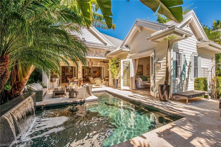 Rarely available newer construction one story home only 3 blocks from the beach with Southern exposure! Custom built by Grand Bay Builders in 2011, this Olde Florida style cottage with cabana has many custom features. The gourmet kitchen is complete with an over-sized limestone island, sandstone backsplash, Wolf, SubZero & Miele appliances, farmhouse sink, wet bar & wine cooler. Additional features include cypress tongue & groove ceilings, wide plank white oak flooring, French doors & a Lutron lighting system. The private cabana includes 1 Bedroom, 1 Bath and a living room that could be utilized as a 4th bedroom. The lushly landscaped outdoor area includes a large covered lanai with electric screens, gas heated pool with water feature and kitchen with gas grill. Additional outdoor features include an outdoor shower, guest parking in rear of home & a stunning front porch with Brazilian Ipe wood decking & a private garden. You must see to appreciate all of the details this open concept home has to offer. New a/c in 2018. Located in Olde Naples, close to 5th Ave S. and 3rd Street S. for boutique shops and dining for every palate