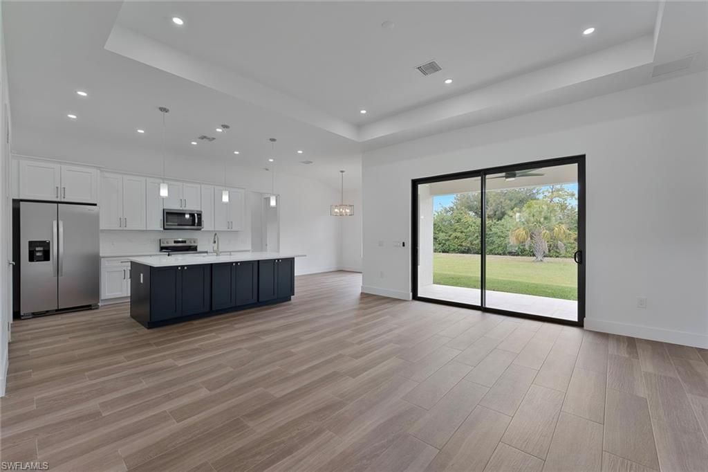 Photo of 717 Theodore Vail ST E, LEHIGH ACRES, FL 33974 (MLS # 226005542)