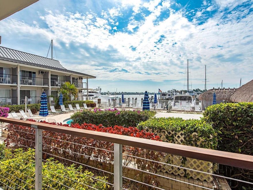 C4714  Enjoy the dazzling view of Naples sparkling bay and beautiful Cove Inn pool. Nicely maintained with updated bathroom, granite counter tops, tile flooring and balcony overlooking the Bay.  Famous Cove
Inn restaurant in lobby, business center and easy  walk to shops, several restaurants, 3rd Street, 5th Avenue and the white sandy beaches of Naples. Several recent upgrades to Hotel including new roof, flooring and railings.   Let  management take care of your condo while you are away and use it yourself when you visit Naples.  The hotel has beach chairs and bicycles or your added pleasure.