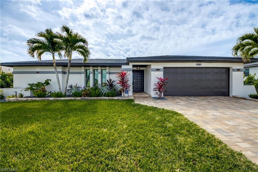 Presenting 1516 SW 47th St, a Gorgeously Remodeled 3BD/2BA Gulf Access Pool Home in SW Cape Coral!
This Exceptional Offering Truly Has It All.  NEVER FLOODED! Turnkey Furnished! Amazing Southern Exposure! New Pavers & Irrigation in 2025! New Saltwater Pool & Spa, Pool Cage, Roll Down Lanai Shutters and Impact Windows in 2024! New Shingle Roof in 2023! Boat Dock w/10,000LB Boat Lift! Only One 10.25 FT High Bridge and Just 2 Miles to Open Water! Other Upgrades Include: Tile Flooring Throughout. SS Appliances. Quartz Countertops. Center Island with Bar Seating. Wine & Coffee Bar with Beverage Cooler. Large Primary & Ensuite Bath with Walk-in Porcelain Tile Shower & Double Vanity. His & Her Primary Walk-In Closet. Secondary Bedrooms with Walk-in Closets. Family Room with Fireplace & Quartz Surround. Designer & Recessed Lighting. Enormous Lanai with Sitting & Dining Areas with BBQ. Air-Conditioned, 2 Car Garage with Extra Capacity W/D, a Built-In Workspace & Tile Flooring. Lush & Mature Tropical Landscaping and So Much More. Competitively Priced & Sure to Impress. Schedule Your Showing Today!