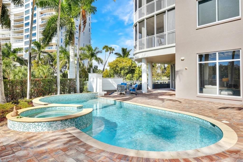 Photo of 13675 Vanderbilt DR #V10, NAPLES, FL 34110 (MLS # 226007844)