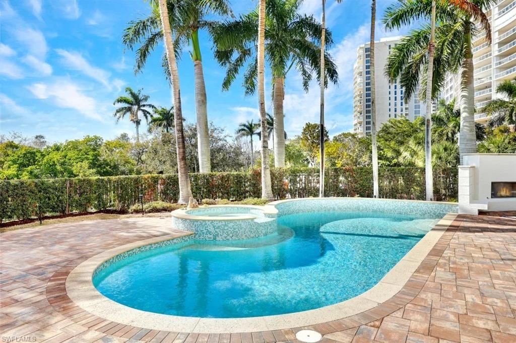 Photo of 13675 Vanderbilt DR #V10, NAPLES, FL 34110 (MLS # 226007844)