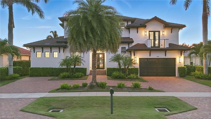 Experience the pinnacle of coastal living in this exquisite newer construction Gulf-access canal home, ideally situated on a private cul-de-sac in the heart of Marco Island. Whether you're seeking a luxurious personal retreat or a high-performing investment property, this turnkey residence delivers on all fronts.
 
Boasting over 4 bedrooms plus a den and 4.5 baths, this home is designed for both relaxed living and unforgettable entertaining. With everyday elegance and hospitality in mind, the home is being sold turnkey and showcases rich hardwood floors, expansive corner pocketing sliders that seamlessly blend indoor and outdoor living, as well as thoughtful upgrades throughout—including a private elevator and two custom-built bars. 
 
The open-concept layout flows effortlessly into an inviting second-floor entertainment room, a brand-new custom bunk room that comfortably sleeps six, and a stunning outdoor living area that defines the ultimate coastal lifestyle. Enjoy year-round sunsets thanks to the coveted western exposure, all from your lanai featuring a WiFi-controlled pool and spa, full outdoor kitchen, and serene canal views. Boating enthusiasts will appreciate the expansive composite dock with an electric-powered boat lift and double jet ski lift leading out directly to the Gulf.  
 
If you’re searching for a sophisticated full-time residence or a luxurious vacation home with no HOA fees and a strong rental history, this Marco Island gem offers it all—just minutes from pristine beaches, upscale shopping, and fine dining.