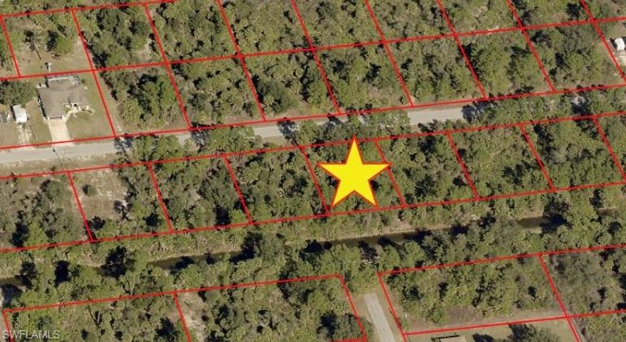 Beautiful quarter acre lot near Alva and Lehigh Acres located near SR 80 and Joel Blvd. Build your dream home or buy and hold investment with low taxes. Enjoy the view of Mike's Canal when the summer rains refill the canal. Conveniently located to I-75, RSW International Airport, Red Sox and Twins training facilities, Florida Gulf Coast University, shopping, dining, entertainment and the amazing SW Florida beaches.