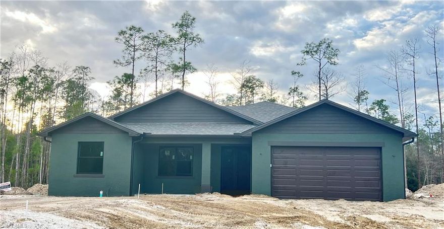 This brand-new 2025 single-family residence is set on 2.5 acres with tranquil preserve views. This thoughtfully designed 3-bedroom, 2-bathroom home includes a 2-car garage and lanai, with completion and move-in readiness scheduled for Spring 2026.

Interior features include tile flooring throughout, granite countertops, stainless steel appliances, Taexx in wall pest control system, impact-resistant windows and doors. The open-concept layout provides comfortable everyday living and flows seamlessly to the rear patio, ideal for enjoying the surrounding natural beauty. The primary bedroom includes a walk-in closet, double vanity, and a tiled walk-in shower.

Additional highlights include a whole-house reverse osmosis system, termite baiting system, sprinkler system, and a gravity-fed septic tank. Conveniently located near a fire/EMS station and just minutes from retail and dining.

A rare opportunity to own new construction offering space, privacy, and modern features.
******With an acceptable offer, the seller is offering the buyer a choice of ONE of the following*****
Blackstone grill with air fryer,
Large-capacity washer and dryer, OR
Screening of the rear lanai.