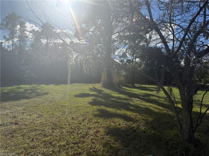 Vacant 0.44-acre lot in highly desirable Alva, conveniently located near local schools, shopping, and major roadways. This beautiful homesite offers the perfect opportunity to build your custom dream home surrounded by mature oak trees that provide natural shade and charm. The property features a peaceful, private setting with ample space for outdoor living, gardens, or a pool. Sewer approved and ready to build, . Ideally situated next to the Caloosahatchee River, offering scenic views and access to water-related recreation. A rare opportunity to own a buildable lot in a growing, sought-after community with a quiet country feel yet close to amenities. Perfect for those seeking a tranquil lifestyle with the convenience of nearby schools and easy access to major roadways.