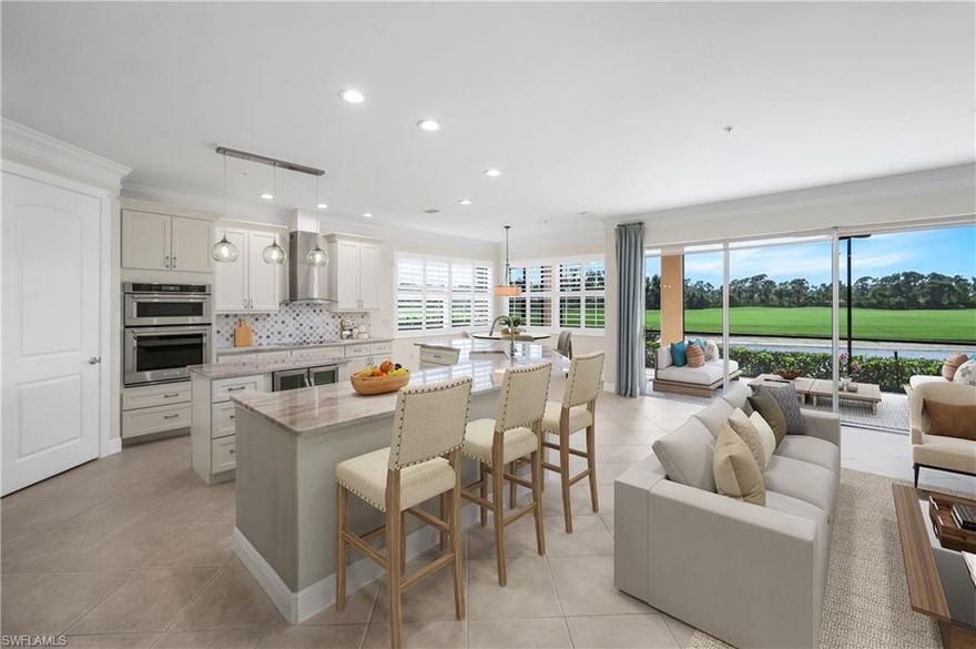 Welcome to this beautifully REMODELED  2-Bedroom + Den, 1st-floor END UNIT CONDO with breathtaking lake, golf course, and preserve views in the sought-after Shadow Wood Preserve.  Most amazing location on the cul-de-sac with plenty of side yard privacy Enjoy spectacular sunsets from the comfort of this open-concept unit featuring tile floors throughout, crown molding, and a newly renovated island kitchen with a walk-in pantry, all new stainless steel appliances, induction cook top stove, wine refrigerator in the island.  The spacious owner's suite offers dual walk-in closets with built-ins, a luxurious bathroom with a separate soaking tub, and a walk-in shower. Both bathrooms have been tastefully remodeled. The oversized, private 2-car garage side entry garage  provides ample storage. Pet friendly. Optional memberships are available to Shadow Wood Country Club and The Commons Club. Enjoy 54 holes of championship golf, 9 Har-Tru tennis courts, pickleball, bocce, walking trails, a community pool, and kayak access on Mullock Creek. With membership, you'll also have access to the private beach club on Little Hickory Island, a state-of-the-art fitness center, a full-service spa, and private dining. All are nestled in a secure, guard-gated community close to Beaches and RSW Airport. Start living the Florida lifestyle you've been dreaming of - move-in ready and maintenance-free.  Beautiful community to walk or bike ride. Walk over to the community park and enjoy pickle ball, tennis, bocce ball, fishing pier, playground or kayak and canoe on the Estero River directly out the Gulf of Mexico.