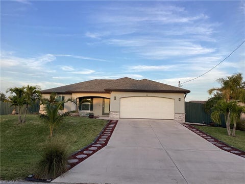 Photo of 309 NW 22nd PL, CAPE CORAL, FL 33993 (MLS # 226038452)