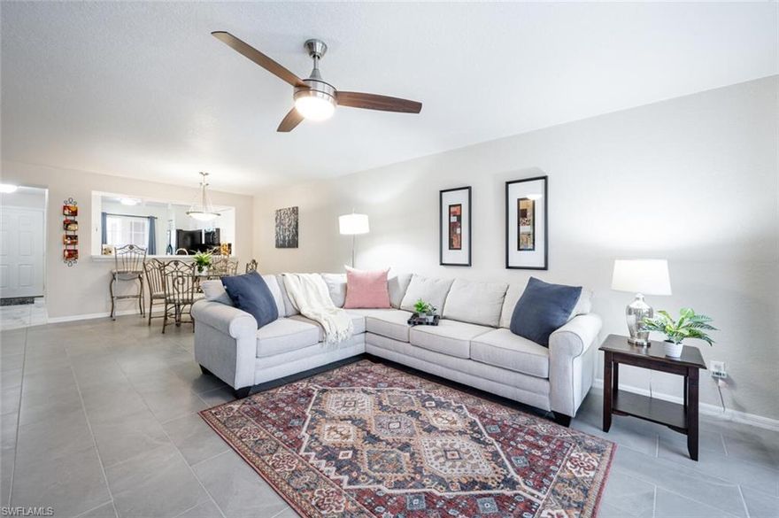 Welcome to your beautifully updated sanctuary in North Naples! This first-floor 2-bedroom condo boasts stunning lake views and a prime location. Recently renovated with elegant crown molding in the bedrooms and new tile throughout, this home exudes modern charm and sophistication.  Imagine relaxing in the spacious living area, bathed in natural light, or enjoying morning coffee on your private lanai overlooking the serene lake.  New ceiling fans and fixtures, updated baths and newer A/C & water heater ensure comfort and efficiency year-round. Located in a highly coveted neighborhood, you'll enjoy proximity to Mercado, restaurants and Vanderbilt Beach enhancing your lifestyle with convenience and leisure.