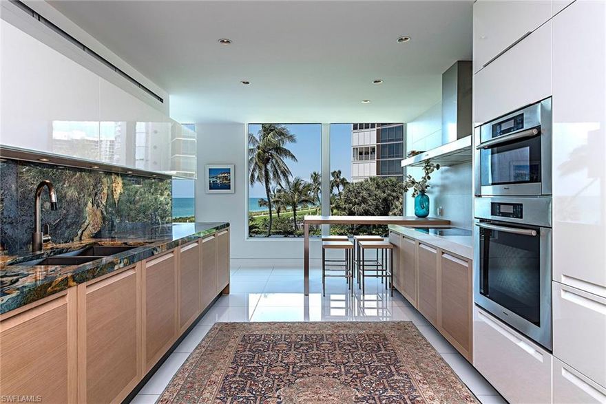 Spectacular sunsets await you from this highly desirable 01’ stack in Park Plaza providing excellent proximity to the sand and epitomizing the true essence of beachfront living. Natural sunlight abounds through stretches of floor-to-ceiling glass boasting wide-open Gulf views from nearly every room. Residents will enjoy the gracious master suite offering a luxurious bath with walk-through shower and full soaking tub all completed with modern, sleek marble finishes. The custom contemporary kitchen includes gourmet appliances while incorporating a minimalist design. Park Plaza offers many amenities complementing this truly spectacular residence, including a fitness center, guest suites, theatre room and roof-top sundeck all only a short stroll to the fine dining and shopping in the Venetian Village.