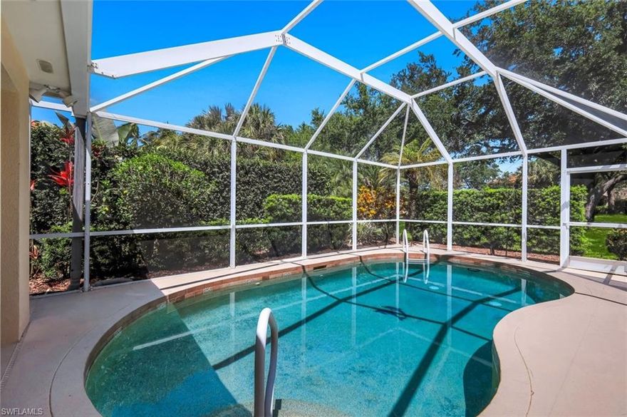 Tropical oasis with private custom pool.  This Capri model with 2bed/2bath and 2 car garage is located in Island Walk Community.  Both bedrooms have walk-in closets. Entertain Family and friends in your kitchen open to the main living area. Plantation shutters on bedroom and living area windows. The home's setting is sunny, lush  and well located within the community.  Upgrades include wooden flooring in both bedrooms, Your caged Lanai features a Custom pool and Newer pool equipment.  There is even a  dedicated home working space in the second bedroom for convenience. The Island Walk Towncenter has been newly renovated. Island Walk Amenities include: a state of the art fitness center, 4 Pickle ball courts,  7 tennis courts and 3 bocce courts. A newly renovated and designed putting green, a resort style pool and a separate lap pool. Other onsite bonuses are IslandWalk Properties for your real estate needs, a fabulous restaurant with access to a resort style pool, hair and nail salons, car wash, post office and gas station, The Town Center houses various activities in its community rooms. Sidewalks to walk and paths to bike. IslandWalk is close proximity to the beach, shopping and great restaurants!