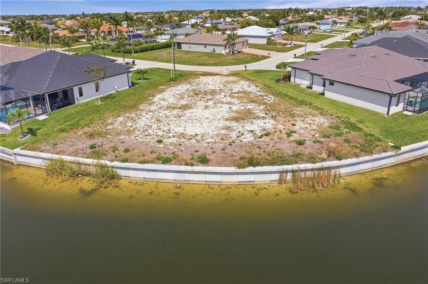 Build your Florida dream home on this exceptional Gulf access lot in highly desirable SW Cape Coral! Offering approximately .28 acres of cleared land, this unique wedge-shaped property provides an expansive feel and generous water frontage—perfect for maximizing your waterfront views and outdoor living design.

The seawall is already in place, saving you time and significant expense as you plan your build. Enjoy this Gulf access location, making this an ideal area for boating enthusiasts looking to explore Southwest Florida’s beautiful waterways right from their backyard.

Situated in a prime location close to local restaurants, shopping, and everyday conveniences, this property offers both tranquility and accessibility. Whether you’re looking to build your seasonal retreat or a full-time residence, this lot presents an outstanding opportunity to create your own slice of paradise.

Don’t miss your chance to own a piece of waterfront living in one of Cape Coral’s most sought-after areas!