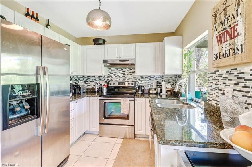 Back to the market!  Buyer could not close.  Don't miss this great opportunity!  Lovely home in a Great Location West of Collier Blvd. Bright and spacious! Not many homes West of Collier on 2.5 acres for this price! Home features updated kitchen with stainless steel appliances, granite countertop with subway tile backsplash. Roof, AC as well as water heater only 4 years old. Home is tiled throughout and lot is cleared. All this on a quiet and beautiful street with lovely homes close to shopping, restaurant, hospitals and I-75. Come check out this home today and make this your peace of heaven!