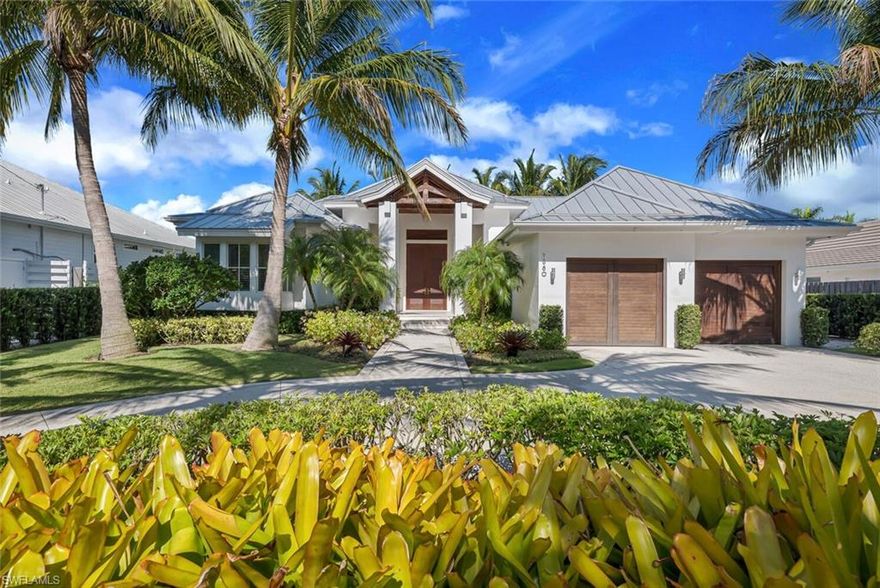 BREATHTAKING HOME BY SOURCE CONSTRUCTION! Absolutely gorgeous 3 bedroom, 3 1/2 bath home is move-in ready. This one of a kind home has split bedrooms and an open floor plan with endless upgrades. Master retreat features huge, dual walk-in closets, dual vanities, soaking tub, large shower with seat and drying area and private water closet. The gourmet kitchen boasts a double wall oven, cook-top with hood and large island. Home is built for entertaining with complete outdoor kitchen and stunning pool/spa complete with new dock and 16,000 lb boat lift!