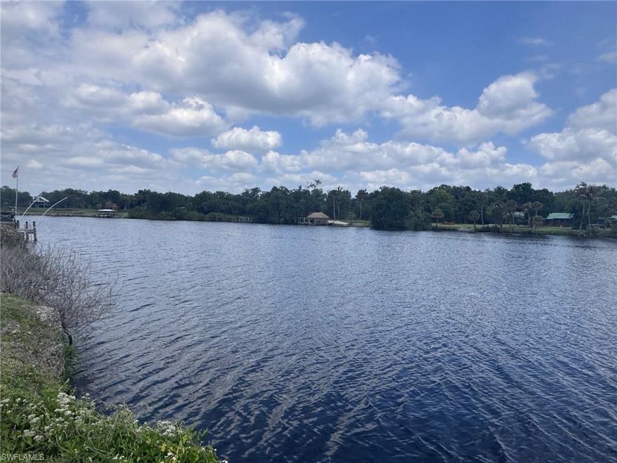 A rare opportunity awaits with this stunning vacant waterfront lot, offering direct navigable access for boating enthusiasts and serene water views.  Oak trees provide a picturesque canopy and natural shade, creating the perfect backdrop for your dream home or weekend retreat. Enjoy peaceful surroundings and the charm of living on the water only approximately 30 miles from Fort Myers.  LaBelle is growing and they aren't making any more riverfront...lock in your slice along the banks of the Caloosahatchee River today.