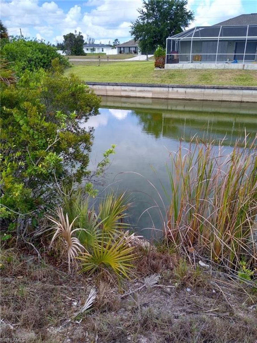 Quiet Gator Circle neighborhood of new homes. Southwest rear exposure on freshwater canal.