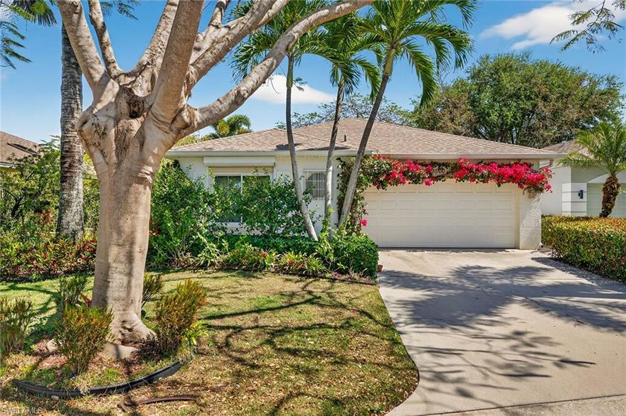 Positioned within the gated community of Villages of Bonita in Bonita Springs, this single-family residence offers three bedrooms, two baths and 1,664 square feet of thoughtfully designed living space, complemented by a tranquil lake view setting. The property has been enhanced with a re-piped system, a 2020 air-conditioning system and a 2013 roof. The renovated kitchen is appointed with granite countertops and custom cabinetry, providing functionality and refined detailing. The main living area is defined by expansive windows and sliding glass doors, creating a seamless connection to the outdoor living space while allowing consistent natural light throughout. A dedicated dining area accommodates a roundtable arrangement suited for everyday living and hosting. The primary suite presents a spacious layout with direct access to the lanai through sliding doors. The en-suite bath has been updated with premium granite surfaces, custom cabinetry, upgraded mirrors and lighting, a walk-in shower, a separate jetted tub and a skylight that introduces additional natural light. Interior finishes include a combination of tile and carpet flooring, and the residence is offered turnkey furnished for immediate enjoyment. Outdoor living is centered around a screened lanai overlooking the lake, framed by tropical landscaping and a garden setting. Additional exterior features include a screened front porch and a driveway, along with hurricane shutters for added protection. A two-car garage provides secure parking and storage. Residents of Villages of Bonita have access to a range of community amenities, including a clubhouse, pool, spa, community room, exercise area, tennis courts and pickleball. The location offers convenient proximity to downtown Bonita Springs and Coconut Point.