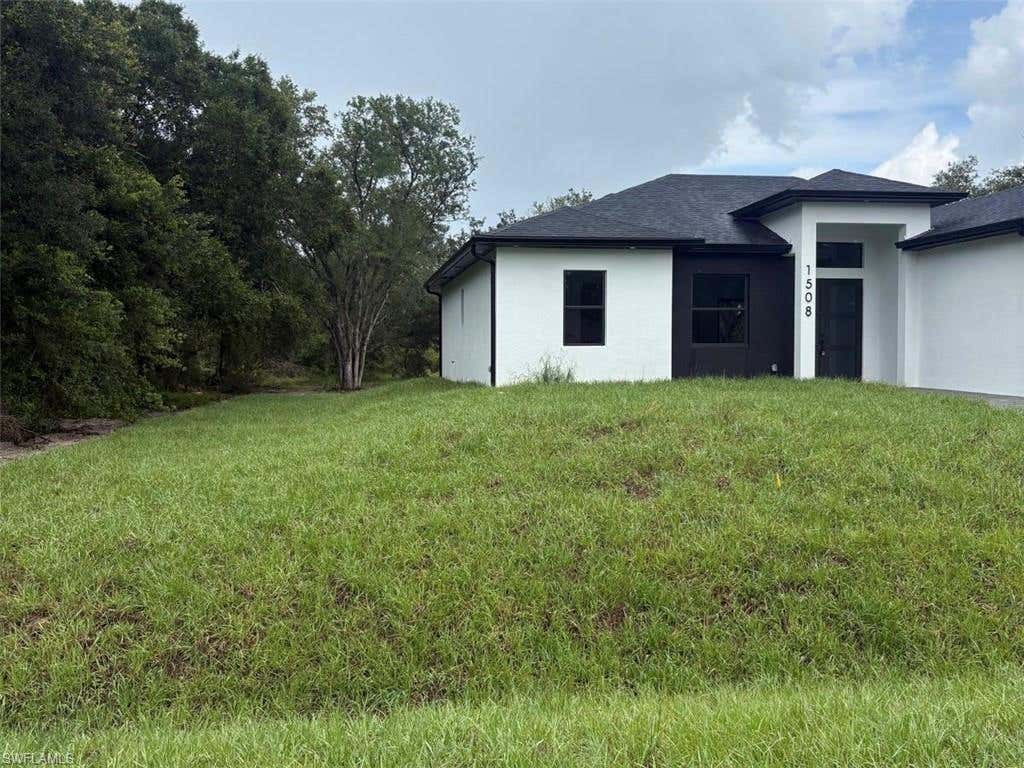 Photo of 1508 McKinley AVE, LEHIGH ACRES, FL 33972 (MLS # 226025113)