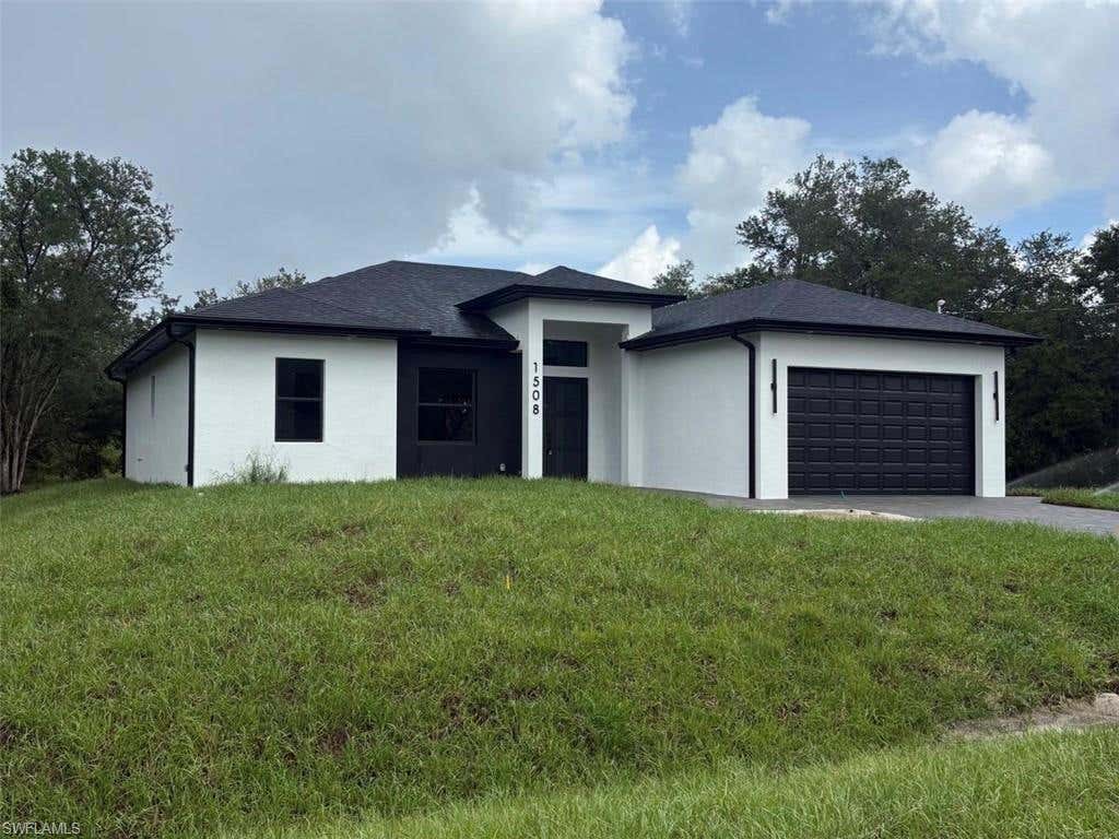 Photo of 1508 McKinley AVE, LEHIGH ACRES, FL 33972 (MLS # 226025113)