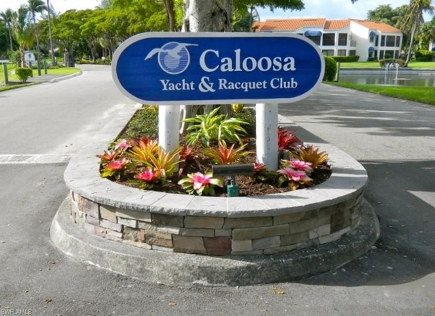 BEST VALUE ~~ AVAILABLE NOW ~~ in The Isles of Caloosa Yacht & Racquet Club! PRICED RIGHT & Ready for You to move in, this 2nd-floor condo features lofty cathedral ceilings and a spacious screened balcony with a LOVELY southern exposure WATER VIEW. Your Eat-in Kitchen has all NEWER stainless steel appliances, a conveniently located stacking Washer & Dryer, raised-panel cabinets, and solid-surface counters. NEWER A/C & water heater. The electric Chair Lift on the stairs will be an asset for anyone with mobility issues.  Enjoy UPSCALE living in a family-friendly, pet-friendly established neighborhood with strong reserves and an array of well-kept amenities. A small, second park, exclusively for the condo owners is a few steps from your attached, covered parking. Monthly fee includes Flood insurance & Lawn Care. No storm damage or flooding here. Enjoy the Heated Olympic-sized pool, Tennis and pickle ball courts and Caloosa's on-site restaurant, The Blue Coyote Supper Club. Park your BOAT in the DEEP WATER MARINA & launch your kayak or canoe on Lake Spinnaker at Caloosa's lovely park. All this IDEALLY LOCATED within 1 hour of 2 airports, 31 public golf courses, excellent schools, health care, golf, shopping & multiple sugar-sand beaches!
