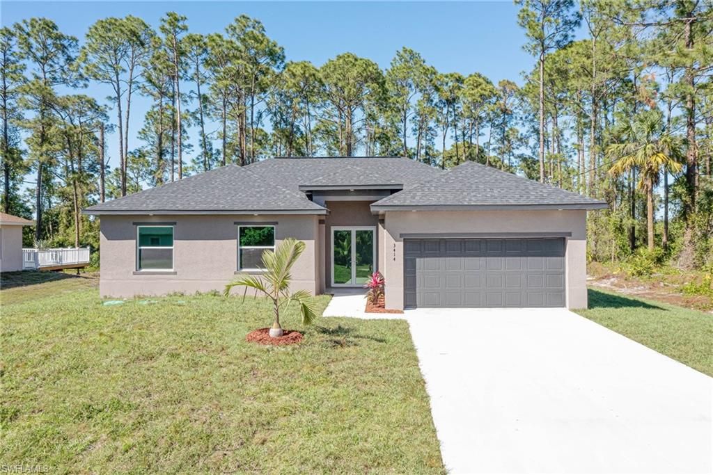 Photo of 3417 71st ST W, LEHIGH ACRES, FL 33971 (MLS # 226017574)