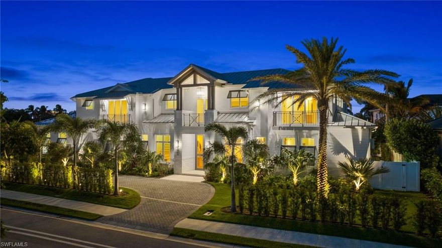 Stunning New Construction Home in X500 FLOOD ZONE, high and dry, no flood insurance required. Nestled in the heart of the Moorings, this exceptional estate by Naples Luxury Builders offers nearly 5,500 square feet of luxurious living space, perfect for large families and entertaining guests. Designed for comfort and elegance, this 2024 built home features 5 bedrooms + office, 5.5 bathrooms, 3 car side garage, and various balconies and terraces throughout. Every detail has been meticulously curated by the award-winning Design West, ensuring designer finishes throughout. The chef’s kitchen is a culinary dream, equipped with a 60" Wolf range, Sub-Zero appliances, a butler's pantry, extra beverage fridges, and a walk-in wine room, complemented by custom cabinetry, two dishwashers, two wet bars, and two laundry rooms. The seamless flow from the living room to the outdoor area creates a resort-like atmosphere. The first-level master suite offers a private retreat, featuring a cozy fireplace, his and hers walk-in closets, 90-degree sliders leading to the outdoor space, and a spa-like master bathroom complete with a steam room. Upstairs, you'll find a loft area, an additional fireplace, and four bedrooms, each with ensuite bathrooms and attached balconies. This luxurious home is equipped with an elevator, an outdoor kitchen, a saltwater pool and spa, fire features, lush landscaping, and a generator for added convenience. Don’t miss the opportunity to make this exquisite property your own! Eligible for the private Moorings beach club, an underrated feature of this desirable neighborhood.