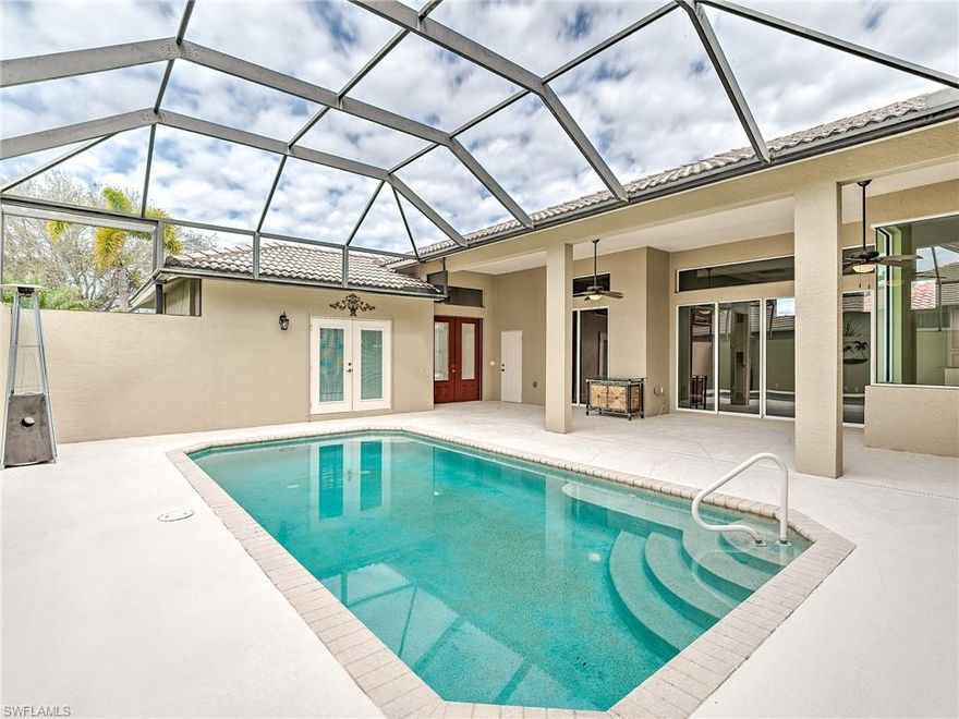 Big Price Improvement and furniture has been removed for quick occupancy, if needed! This special floor plan offers 2,637 sq. ft. and features a separate Guest House, very Private Pool, 3-car garage and a spacious Lanai! The Family/TV Room has pocket sliders out to the Courtyard for entertaining! Every Chef will appreciate the Gourmet Kitchen with 42" custom cabinetry, upscale appliances and granite counters. Two flex-spaces, the Guest House & Den, allow for more Bedrooms, Offices, Hobby Room or a Gym. Exceptional crown molding, marble floor in the Living Room, split A/C systems, Kohler fixtures, a real Fireplace, and beautiful transom windows light up the rooms! Most of the window shutters are electric! It's located on a well landscaped, high and dry 90’ x 175’ lot. Spanish Wells is only 3 miles to Bonita and Barefoot Beaches, is 22 Minutes from RSW airport, and 9 minutes North to Coconut Point Mall or the bustling Mercato in Naples. The Master Association owns the Clubhouse and Golf Course but Social, Fitness (Tennis & Pickleball) and Golf Memberships are not mandatory. Public Play on 27 holes of golf is available so invite family, friends and guests to a game! See it soon and add some sizzle to your Florida lifestyle!