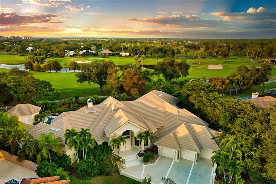 Discover an extraordinary masterpiece by Shane Ames, winner of Best Residential Architecture Firm in North America. Perched on two rare bi-shaped, elevated lots—the only raised lots in the community—this Italianate estate offers breathtaking golf course views, unmatched privacy, and timeless elegance. Designed for entertaining and refined living, the expansive open floor plan boasts high ceilings, sunlit interiors, and a gourmet kitchen with expensive custom-made Italian cabinetry, new countertops, and top-of-the-line appliances. The master suite, with its exquisite Portuguese marble flooring and spa-like bathroom, provides a serene retreat, while a separate guest house ensures added privacy and comfort for visitors. Step outside into your private tropical oasis: an entirely new resort-sized pool with updated equipment, tiles, and a soothing waterfall is the centerpiece of this stunning outdoor space. The spacious patio, cabana, and spa create the perfect setting for hosting gatherings or relaxing in style. With a brand-new roof, grand entrance, and freshly renovated interiors, every detail reflects modern luxury and meticulous care. Located just 10 minutes from pristine beaches and upscale shopping, this estate is both secluded and convenient. Opportunities to own a home of this caliber are rare—schedule your private showing today to experience the height of luxurious living! One or more photo(s) has been virtually staged, AI generated or rendered.