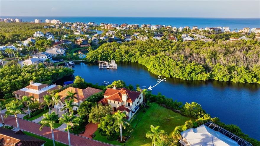 Experience Southwest Florida living at its finest. This meticulously maintained home was constructed with an eye to quality and attention to detail. Enjoy both the benefits of a friendly neighborhood as well as the feeling that your are living in a private nature preserve. Ideally situated, every room has a view of the water where you can see fish jumping, herons and egrets fishing, osprey nesting and dolphins swimming. The built to last IPE wood dock has 2slips with a kayak lift for easy access to the famed Calusa Blueway kayak trail. 2 routes to the gulf are  easily accessible. Either bring your own boat or rent one minutes away.The amazing lanai features disappearing screens and storm shutters, a brand new grill, a woodburing fireplace, an outdoor rated TV, and a beverage refrigerator. Open up the fully retractable sliding glass doors to create an expansive indoor/outdoor space with a living level infinity edge pool and spa. Relaxed elegance is epitomized with the beautiful hand-curated Italian and Mexican tile accents throughout. The house is fully ADA accessible with a 3 story elevator. The expansive kitchen is a chef's dream, featuring top of the line Miele and Wolf appliances, a beautiful oversized granite island, a butler's pantry, wine refrigerator, 2 idshwashers and a warming drawer. The cosy office/den provides a quiet workspace and intimate lounge area for evening relaxation. All bedrooms have private balconies and spacious en suite bathrooms with an additional secluded outdoor shower off the primary bath. This property has two 3 car garages with plenty of space for your outdoor toys and a fully tiled lower level. And so much more! 10 minute walt to the beach & restaurants, brick driveway, lovely landscaping, outdoor pool bath, beautiful wrought iron railings, 2 story living room with wood burning fireplace, sonos sounds system with integrated speakers
8 Cable TV connections, Integrated pest control system, wood beamed ceilings, large 3rd floor deck, Travertine and hardwood floors, New HVAC system and whole house dehumidifier, Separate trash room, generator, friendly, gated community.  From the quiet sunrises to the gorgeous sunsets, this is a home to fall in love with.