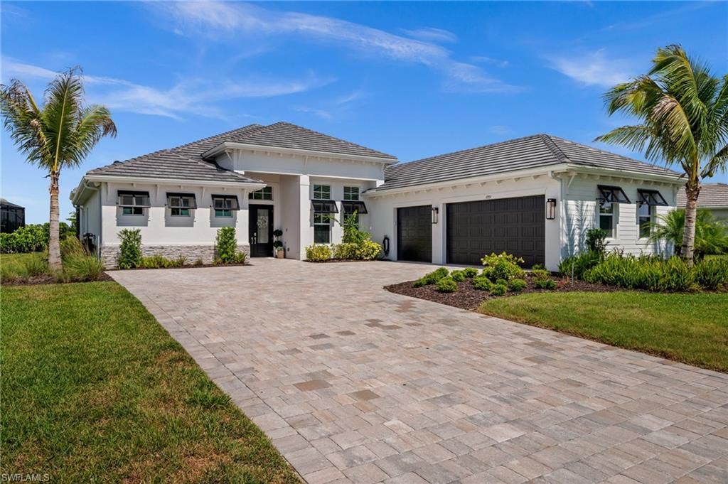 Photo of 17351 Blue Sapphire DR, FORT MYERS, FL 33913 (MLS # 226016933)