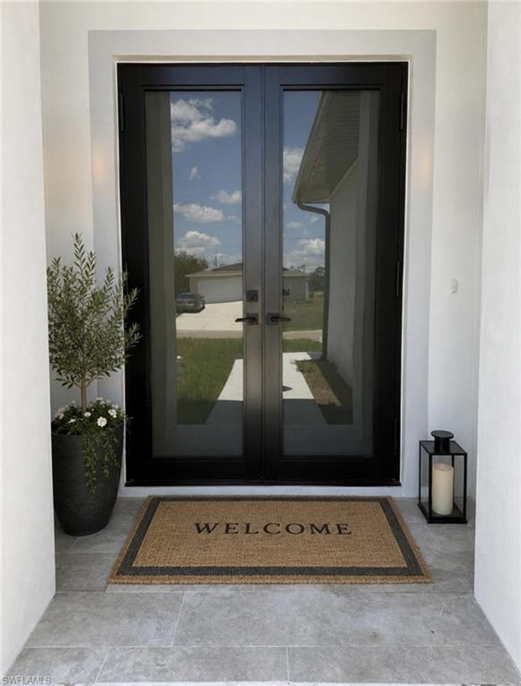 Photo of 1024 Halby AVE S, LEHIGH ACRES, FL 33974 (MLS # 226019871)