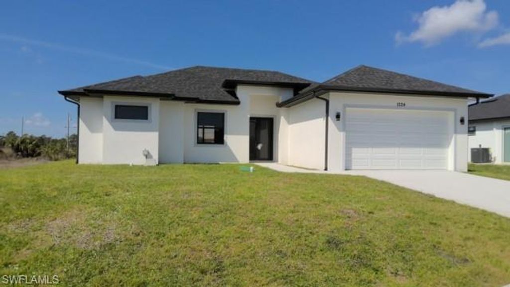 Photo of 1024 Halby AVE S, LEHIGH ACRES, FL 33974 (MLS # 226019871)
