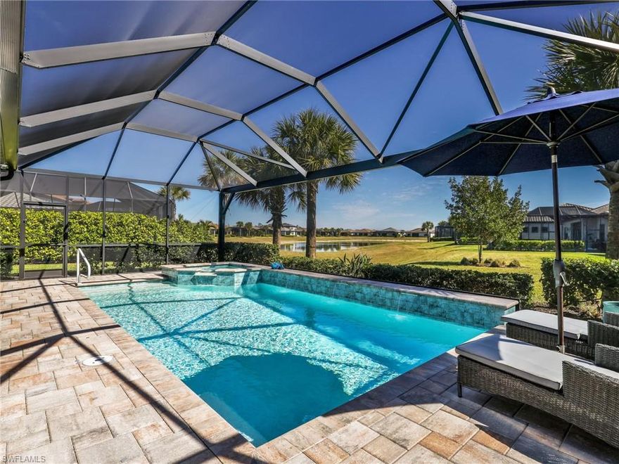 Welcome to this better than new Mystique CUSTOM POOL & SPA home by Pulte, ideally located in the finished section of Verdana Village with no construction mess and no waiting. This 3 bedroom plus den, 3 full bath home offers an exceptional layout with extensive builder upgrades including an extended lanai, zero corner slider that seamlessly blends indoor and outdoor living, 8 foot doors, a double oven, tray ceilings, a finished laundry room, and a 4 foot garage extension for added storage. After move in, the owners elevated the home even further with luxury vinyl flooring throughout that is easier on the joints and eliminates grout lines. Prefer tile? It's brand new under the LVP in the main living areas and can be unveiled with ease! The owners also added crown molding, plantation shutters throughout, a whole home water conditioning system, professional landscape lighting, Storm Smart hurricane shades and shutters, a whole home surge protector, an epoxy garage floor, and an insulated garage door to help keep the space cooler. Electric range and dryer have gas hookups if that's your preference. Every upgrade has already been completed, saving you time, money, and the wait for new construction. Verdana Village is Estero’s top selling community, featuring unmatched resort style amenities including indoor and outdoor pickleball and tennis, multiple restaurants and bars, several community pools, two fitness centers, bocce courts, a covered playground, an active social calendar, and on site tennis and pickleball pros, all with low HOA fees! This move in ready home offers luxury, convenience, and a resort lifestyle that is truly hard to match.