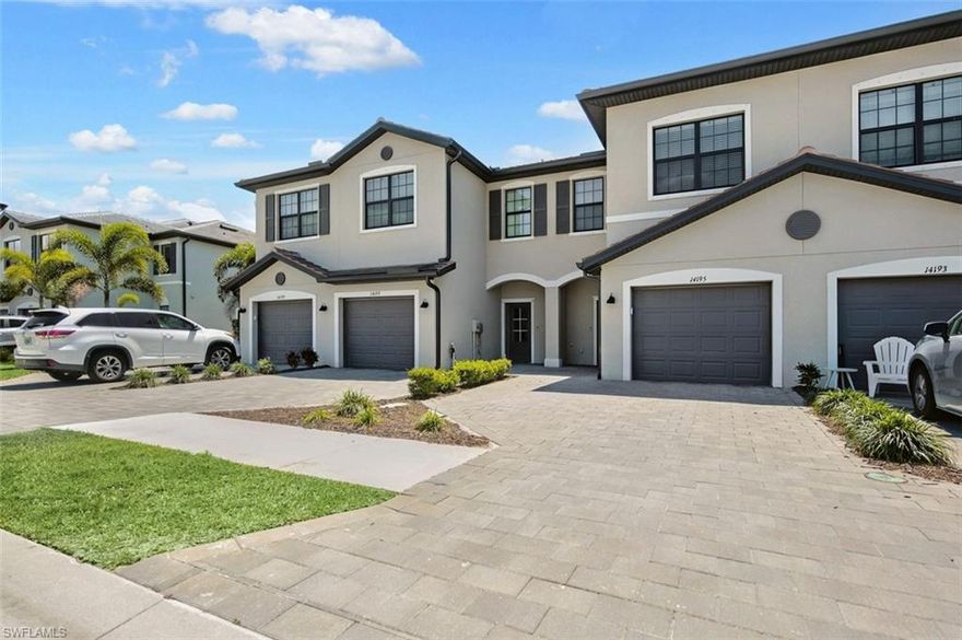 This remarkable townhouse, situated in the amenity-rich Timber Creek community, offers over 1942 square feet of bright and welcoming living space. It features 3 bedrooms, 2.5 bathrooms, and a one-car garage complemented by a stylish paver driveway, merging functionality with aesthetic charm. Upon entry, you will be welcomed by a warm and airy atmosphere. The open-concept main level is highlighted by custom lighting and contemporary tile flooring. The spacious kitchen is a culinary enthusiast's paradise, equipped with granite countertops, stainless steel appliances, elegant white shaker cabinets embellished with crown molding, and a convenient breakfast bar. On the upper level, the ample primary suite boasts an ensuite bathroom with dual vanities and a glass-enclosed shower, while all bedrooms are fitted with plush carpeting for enhanced comfort. Outdoor living is a delight on the screened lanai that overlooks a generous backyard. The assurance that the home is not located in a flood zone provides peace of mind. Timber Creek is a vibrant community that promotes a resort-style lifestyle with a wide array of activities suitable for all ages. Residents can enjoy multiple pools, a clubhouse, a fitness center, sports courts, pickleball, a putting green, a sauna, and even an on-site restaurant. Ideally located in Fort Myers, just off Daniels Parkway and Route 82, this home is mere minutes from JetBlue Park, RSW International Airport, The Forum, and a variety of shopping, dining, and entertainment options. Do not miss this opportunity to acquire a stunning home in one of Fort Myers' most desirable communities!
