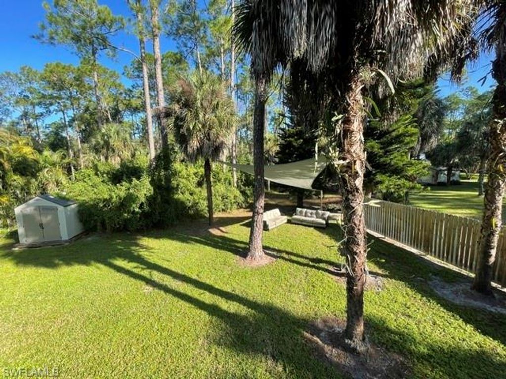 Photo of 4921 Teak Wood DR, NAPLES, FL 34119 (MLS # 226010138)