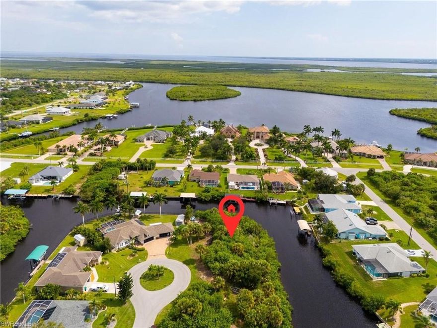 Discover the ultimate waterfront canvas for your dream home with this exceptional TIP LOT! Boasting approximately 225 feet of prime saltwater frontage on 0.39 acres and stunning views of intersecting canals, this property is a true gem. Nestled near the desirable Collinswood Pointe/O Hara Drive area, you'll enjoy the perfect blend of tranquility and convenience. With schools, dining, shopping, and golf all just moments away, this location offers everything you need to create your perfect lifestyle. Don’t miss your chance to own this breathtaking slice of paradise!