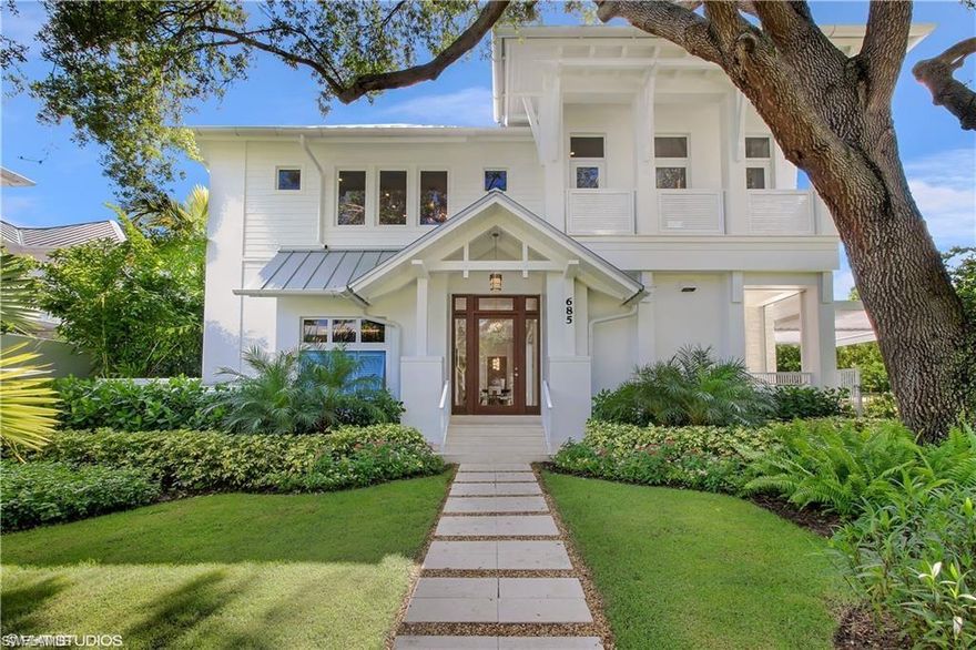 Perfectly positioned on a coveted corner of 2nd Street South and 7th Avenue South, this exceptional Olde Naples estate captures the essence of timeless coastal elegance paired with elevated modern design. Enveloped beneath a canopy of majestic oak trees and oriented for prized southern exposure, the residence is bathed in natural light, creating a luminous and inviting ambiance throughout.

Masterfully designed by MHK Architecture, this five-bedroom plus den home is a refined interpretation of the classic Florida cottage, thoughtfully reimagined with sophisticated architectural detail and contemporary flair. Interiors are curated with an uncompromising eye—where bespoke finishes, clean lines, and warm textures come together to create a seamless balance of comfort and luxury. Indoor outdoor living is perfectly matched with a private lush landscaped backyard featuring a gas outdoor kitchen, fireplace & heated pool & spa. 

Just two blocks from the sugar-white sands of the Gulf and moments from the world-class boutiques and dining of Fifth Avenue South, the home offers an unparalleled walkable lifestyle in one of Naples’ most prestigious enclaves.

This is a rare opportunity to own a signature property in the heart of Olde Naples—where iconic charm, thoughtful design, and modern sophistication converge in effortless harmony.