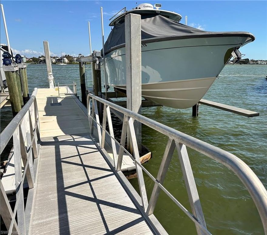 Stunning boat slip in the heart of Naples with private gated entrance, perfectly positioned to keep your vessel in great proximity to downtown dining, shopping, and beach access. Includes private boat lift and private parking accommodating vessels up to sixty feet, currently has a boat lift with a boat that is not being sold with sale.