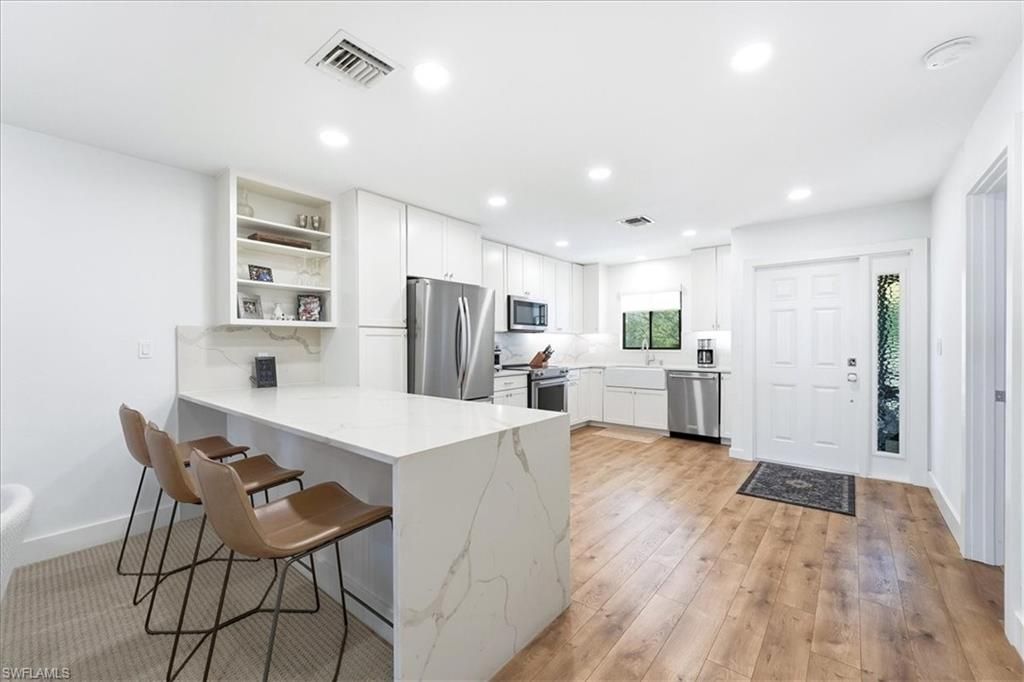 Photo of 4062 Belair LN #9, NAPLES, FL 34103 (MLS # 226007645)