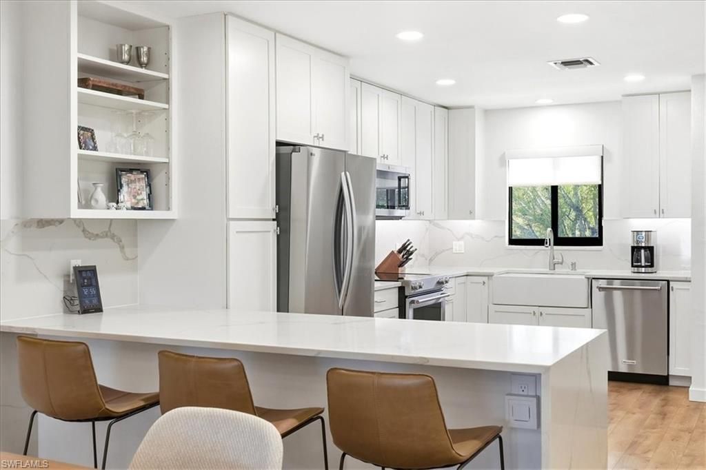 Photo of 4062 Belair LN #9, NAPLES, FL 34103 (MLS # 226007645)