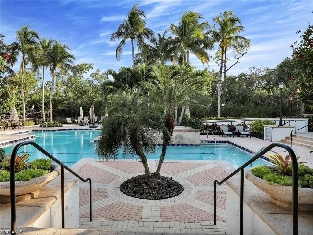 Photo of 455 Cove Tower DR #303, NAPLES, FL 34110 (MLS # 226010393)
