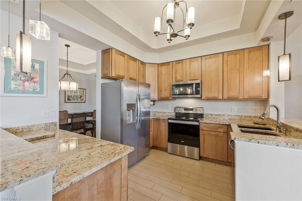 Photo of 24640 Ivory Cane DR #101, BONITA SPRINGS, FL 34134 (MLS # 226009763)