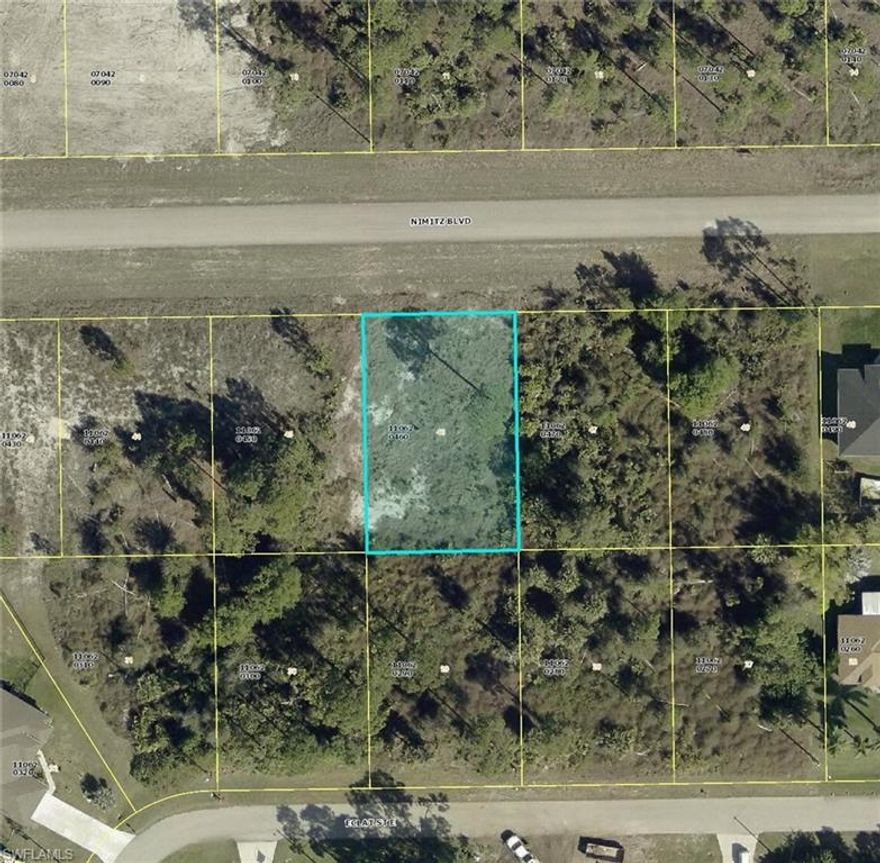 Prime Residential Lot on Nimitz Boulevard Exceptional opportunity to build your custom home on this 0.23-acre level lot in the heart of Lehigh Acres. Zoned RS-1, this property is ideally suited for a modern single-family residence. Located on Nimitz Blvd, you’ll enjoy a paved road and a central location with quick access to Lee Blvd, State Road 82, and local shopping hubs. No HOA or CDD fees offer you the freedom to design your Florida lifestyle without restrictions. With new construction rising throughout the neighborhood, this is a perfect time to secure your piece of the Sunshine State