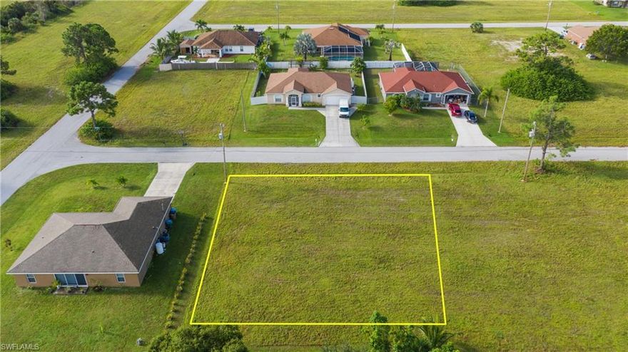 Have you heard - Cape Coral is booming! Take this opportunity to pick the location of your new home. Definitely priced to sell!  Be one of the many who are choosing to make Florida the place to live. Please note any future assessments for City water, Sewer and Irrigation that may be assessed is to be assumed by the buyer. Yellow outlined area on drone photos are approximate based on Google Earth and Lee county lines.