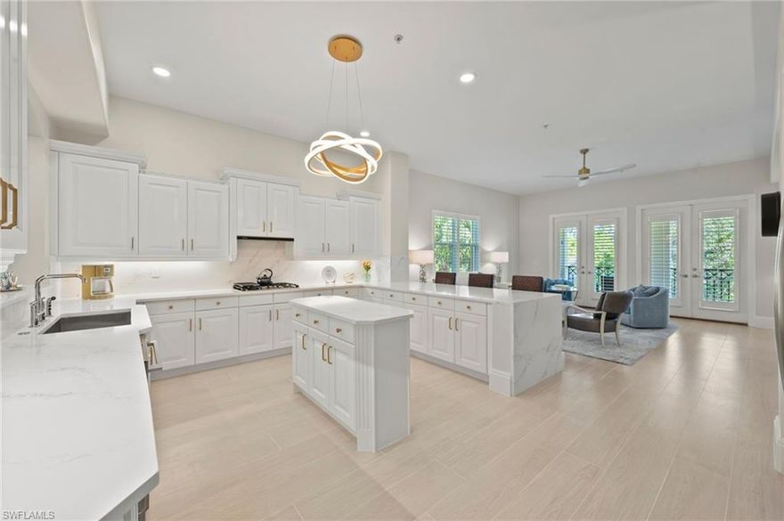 Welcome to this rarely available, fully remodeled Castillo Penthouse, ideally positioned at the end of a picturesque cul-de-sac and offering exceptional privacy. This residence has just undergone a comprehensive custom renovation featuring new wood-plank tile flooring and fresh paint throughout, along with a brand-new gourmet kitchen showcasing white soft-close cabinetry, elegant quartz countertops, new appliances, a gas cooktop, and premium Kohler plumbing fixtures. The spa-inspired bathrooms are appointed with quartz countertops, a soaking tub, frameless glass showers, new vanities, Kohler fixtures, and dimmable, anti-fog mirrors. The penthouse offers two expansive living and entertaining areas, providing an ideal layout for both everyday living and hosting guests. Enjoy nearly 700 square feet of covered lanai space overlooking a serene preserve—one of the most tranquil settings in all of Tiburón. Southwestern exposure delivers breathtaking sunset views, while a second balcony facing the fountain cul-de-sac offers the perfect spot for morning coffee.
Additional recent upgrades include custom-built closet systems, designer light fixtures, a new washer and dryer, and a brand-new tankless water heater. Electric shutters on all lanais provide added peace of mind while away. Every detail has been thoughtfully curated. Building renovations have also been completed and include a new roof, new screens, fresh exterior paint, and a beautifully remodeled lobby. The attached two-car garage provides direct access to your private elevator, which opens into the penthouse featuring soaring 10’6” ceilings. A SIGNATURE MEMBERSHIP ($50K value) IS INCLUDED - offering immediate access to exclusive Golf and Social Memberships, and all of the amazing Ritz-Carlton amenities. These include the Reservoir water experience with waterslides, lazy river, cabanas, resort-style pool, tennis facilities, fitness center with personal trainers and classes, beach transportation to Vanderbilt Beach, airport shuttle services, and curated concierge events. Tiburon also offers 36 holes of championship golf designed by Greg Norman and a 27,000-square-foot golf club. Ideally located where beach days, fine dining, and shopping are all just minutes away.