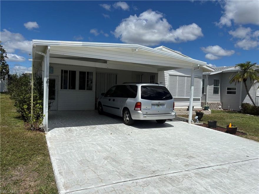 THIS SPACIOUS AND VERSATILE HOME HAS SOMETHING FOR EVERYONE AND FEATURES TWO BEDROOMS, 2 BATHROOMS, AN ENCLOSED VERANDA ROOM AS WELL AS A LARGE ENCLOSED LANAI. EVEN THE WASHER AND DRYER HAVE THEIR OWN ROOM WHICH LEADS TO A LARGE SHED/WORKSHOP/MAN CAVE! A FORMAL DININGROOM BOASTS A BUILT IN CHINA CABINET FOR WHEN THE FRIENDS COME TO DINE UNLESS YOU OBT TO BE MORE CASUAL AND EAT IN THE QUAINT BREAKFAST NOOK. THE CARPORT PROVIDES AMPLE PARKING FOR AT LEAST TWO VEHICLES AND COULD ACCOMODATE A BOAT EASILY. ENCHANTING SHORES ALSO HAS SOMETHING FOR EVERYONE WITH MULTITUDES OF ACTIVITIES, SHOWS, CLUBS AND BELOVED BINGO! LAUNCH YOUR WATERCRAFT RIGHT DOWN THHE ROAD AND CRUISE OFF TO THE GOLF OF AMERICA WHENEVER THE MOOD STRIKES YOU.  THIS IS ALOT OF HOUSE FOR AN AFFORDABLE ASKING PRICE AND IS LOCATED IN THE MOST WELL MAINTAINED PARK OF ITS KIND IN SWFL WITH UNUSUALLY LOW HOA FEES! ESC IS THE PLACE TO ESCAPE THE MISERABLE COLD WEATHER OR IS AN EXCELLENT PLACE TO EESTABLISH YOUR YEAR ROUND RESIDENCE.