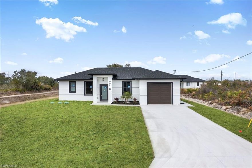 Seller is motivated and ready to make a deal! 10 Year Structural Warranty and 3% seller credit toward buyer’s closing costs with full-price offer. 100% completed and ready to move-in. Be sure to click on the 3D virtual tour! This beautifully designed new construction home sits on a corner lot and offers a modern living space. Featuring 3 bedrooms, 2 bathrooms, and a 1-car garage, the home includes 10-ft ceilings, hurricane-impact windows and doors, and washer/dryer installed in a separate laundry room. Enjoy 32x32 porcelain tile flooring throughout, high-profile baseboards, and a spacious kitchen with custom cabinetry, quartz countertops, and a full suite of Samsung stainless-steel appliances. Bathrooms showcase quartz finishes, glass shower doors, and premium fixtures. The property also includes a full irrigation system. Surrounded by new homes in the desirable 33976 zip code, this residence combines style, quality, and value. Don’t miss your chance!